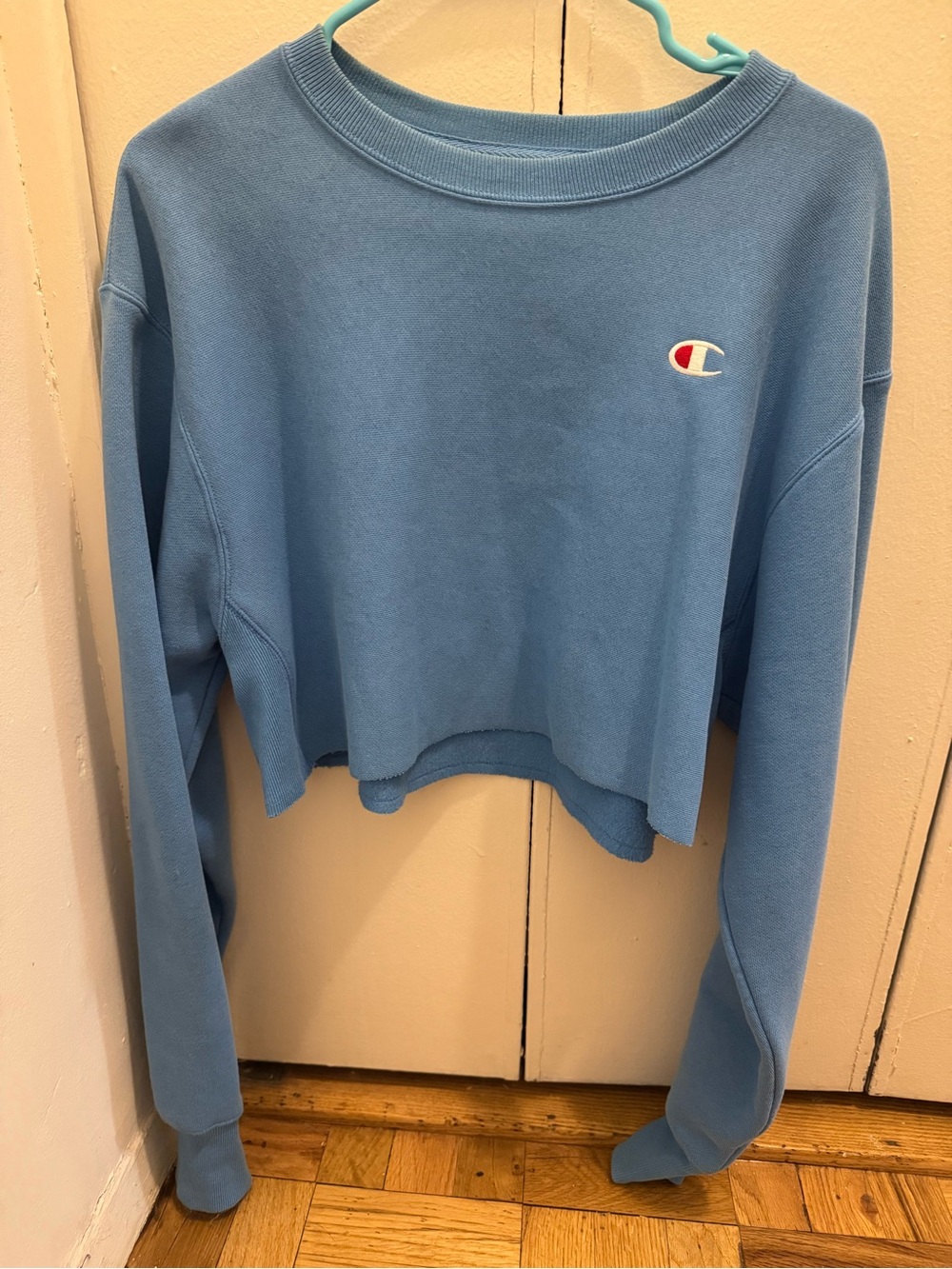 Champion Women’s Sky Blue Cropped Crewneck Sweatshirt